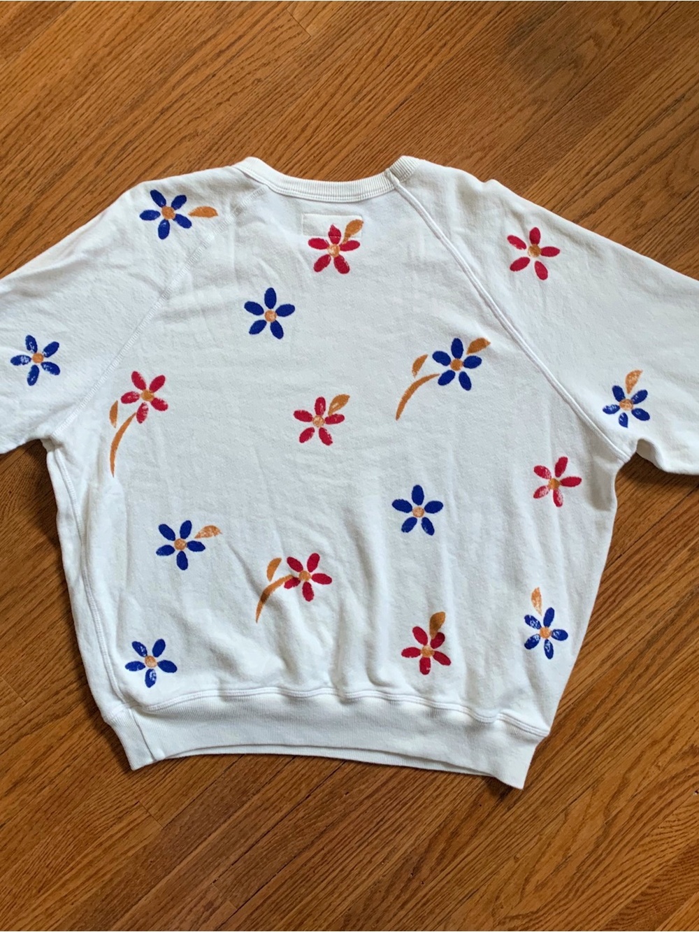 THE GREAT. Cream Hand Painted College Sweatshirt with Red and Blue Flowers - Picture 2 of 5